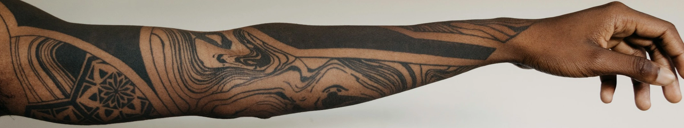Long tattooed arm
